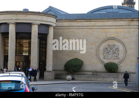 Glasgow, UK. 14 February 2019. Scenes from outside of the court during Alesha McPhail's Murder Trial. Alesha's body was found in the grounds of a former hotel on 2 July last year.  Not able to name the accused. It is illegal in Scotland to publish the name, address, school or any other information which could identify anyone under the age of 18 who is the accused, victim or witness in a criminal case  This law applies to social media as well as to websites, newspapers and TV and radio programmes. Credit: Colin Fisher/Alamy Live News Stock Photo