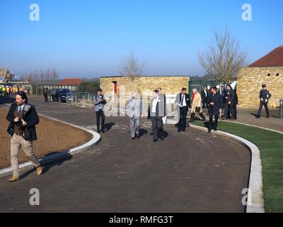Bletchingdon, Oxfordshire, UK. 15th Feb 2019. Prince Charles the Prince of Wales meets dignitaries, workers and residents during a visit to a housing development in Bletchingdon, part of the Duchy of Cornwall’s Eastern District. He also visited Bletchingdon Parochial Church of England School and Bletchingdon Village Hall. Credit: Angela Swann/Alamy Live News Stock Photo