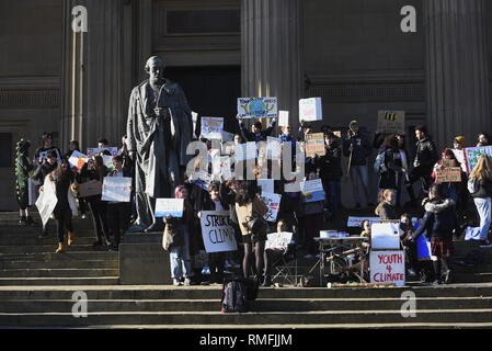 Liverpool, UK, Friday 15th February 2019, Student strike organised by a student grassroots movement, UK Student Climate Network and Schools 4 Climate Action with flags and placards on St George's Plateau, Liverpool city centre. Credit David J Colbran / Alamy Live News Stock Photo