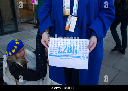 London, UK. 15th Feb, 2019.  No to death by Brexit campaigners stage a stunt outside Dept of Health and Social Care headquarters opposing the lack of clear guidance that medical supplies will be maintained after Brexit. The stunt was people in sheets of body bags lying outside the entrance at 39 Victoria Street, London SW1 Credit: Bruce Tanner/Alamy Live News Stock Photo