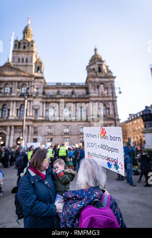Glasgow, UK. 15th February 2019. Children gather in front of Glasgow City Chambers as part of the Climate Change Strike protest. Hundreds of students and school pupils across Scotland took part in this week’s first UK-wide youth strikes, calling for governments around the world to take urgent action on climate change. Credit: Andy Catlin/Alamy Live News Stock Photo