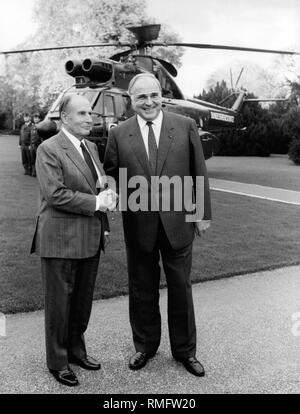 On the left, French President Francois Mitterrand, on the right, Federal Chancellor Helmut Kohl. In the background is a 'Puma' helicopter of the Federal Border Police. Stock Photo