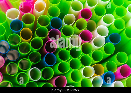 Abstract colorful background. Background from cocktail tubes close up. Soft focus. Cocktail tubes of different colors close up.Close-up of straw tubes Stock Photo