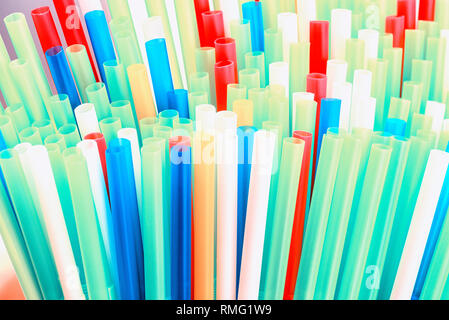 Abstract colorful background. Background from cocktail tubes close up. Soft focus. Cocktail tubes of different colors close up.Close-up of straw tubes Stock Photo