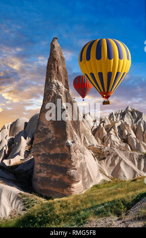 Pictures & images of hot air balloons over the fairy chimney pillar rock formations  near Goreme, Cappadocia, Nevsehir, Turkey Stock Photo