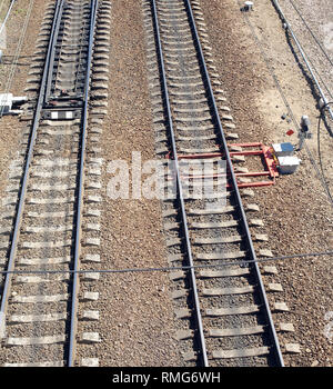 Arrow Rails. Rail and concrete sleepers closeup Stock Photo - Alamy