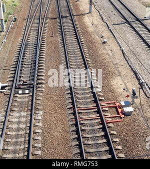 Arrow Rails. Rail and concrete sleepers closeup Stock Photo - Alamy