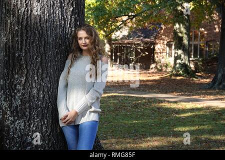 country young woman in a Fall country setting Stock Photo