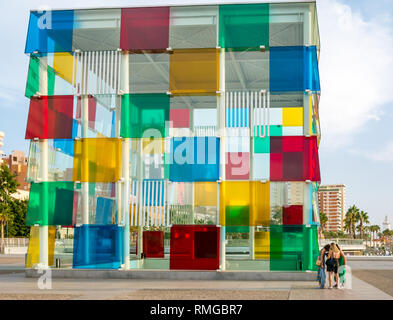 Women conferring next to Pompidou Centre, Malaga, Andalusia, Spain Stock Photo