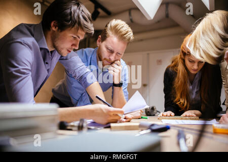 Business people collaborating in office and working on project together Stock Photo