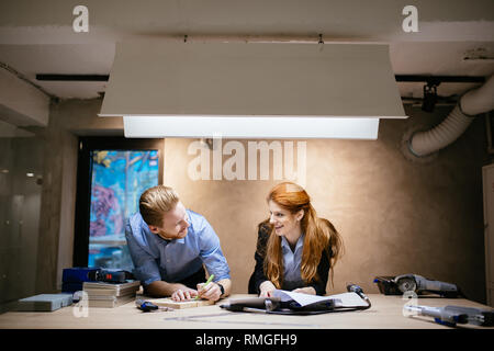 Business people collaborating in office and working on project together Stock Photo