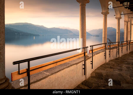 Colonnade overlooking the lake, Hermitage of Santa Caterina del Sasso (XIII Century), Lake Maggiore, Lombardy, Italy Stock Photo