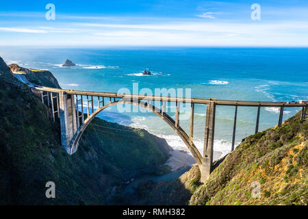 Aerial Bixby Bridge (Rocky Creek Bridge) and Pacific Coast Highway near Big Sur in California, USA America. Drone Shot Stock Photo