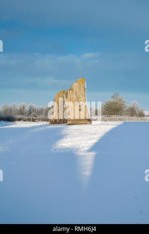 Avebury stone circle in the morning winter snow. Avebury, Wiltshire, England. Stock Photo