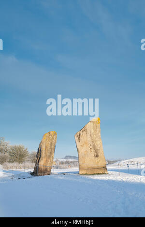 Avebury stone circle in the morning winter snow. Avebury, Wiltshire, England. Stock Photo