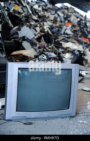 GERMANY, Hamburg, recycling of electronical scrap and old consumer goods at company TCMG, the trash is collected by the urban waste disposal system and than processed and separated here after metals like copper and plastics for further recycling and reuse, by law is not allowed to export e-scrap to africa and other countries Stock Photo