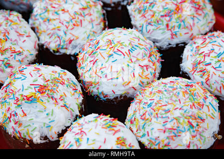 lot Easter cakes decorated with multicolored dusting Stock Photo