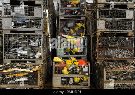 GERMANY, Hamburg, recycling of electronical scrap and old consumer goods at company TCMG, the trash is collected by the urban waste disposal system and than processed and separated here after metals like copper and plastics for further recycling and reuse, by law is not allowed to export e-scrap to africa and other countries Stock Photo