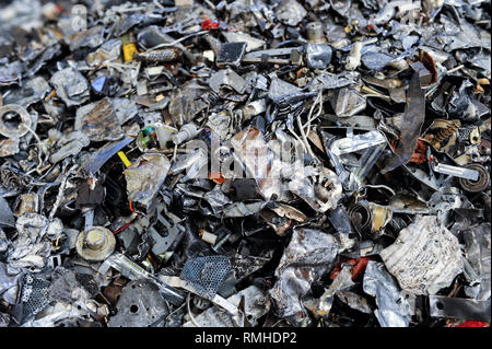GERMANY, Hamburg, recycling of electronical scrap and old consumer goods at company TCMG, the trash is collected by the urban waste disposal system and than processed and separated here after metals like copper and plastics for further recycling and reuse, by law is not allowed to export e-scrap to africa and other countries Stock Photo