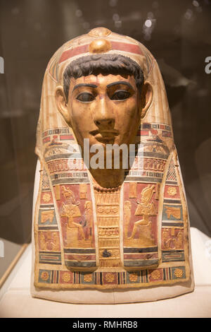 Mummy Mask of a Man, stucco, gilded and painted, Roman period, early 1st century, c.e. combined contemporary and traditional elements. Brooklyn Museum, Brooklyn, NY. Stock Photo