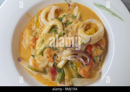 Stir-Fried Squid with Salted Duck Eggs or  (bplaa meuk phat khai khem) Stock Photo