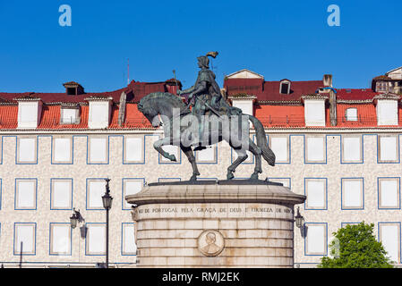 a bronze equestrian statue representing King John I, by sculptor Leopoldo de Almeida in the Praça da Figueira,  Lisbon, Portugal Stock Photo