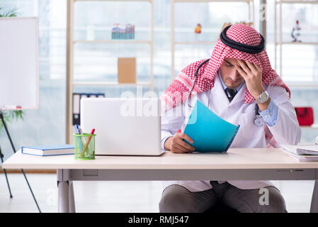 Arab doctor working in the clinic Stock Photo