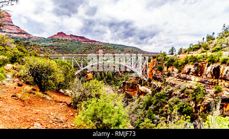 The steel structure of Midgely Bridge on Arizona SR89A between Sedona and Flagstaff. The bridge span crosses Wilson Canyon at Oak Creek Canyon, USA Stock Photo