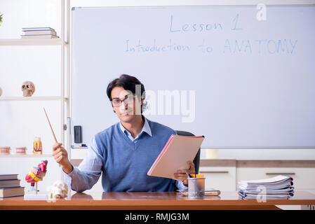 Young lecturer teacher teaching anatomy Stock Photo