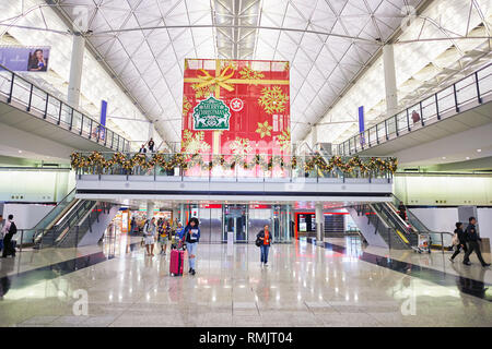 HONG KONG - CIRCA DECEMBER, 2014: inside of Hong Kong International Airport. Hong Kong International Airport is the main airport in Hong Kong. Stock Photo