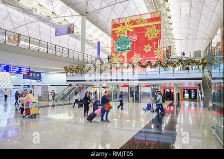 HONG KONG - CIRCA DECEMBER, 2014: inside of Hong Kong International Airport. Hong Kong International Airport is the main airport in Hong Kong. Stock Photo