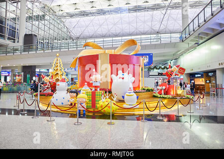 HONG KONG - CIRCA DECEMBER, 2014: inside of Hong Kong International Airport. Hong Kong International Airport is the main airport in Hong Kong. Stock Photo