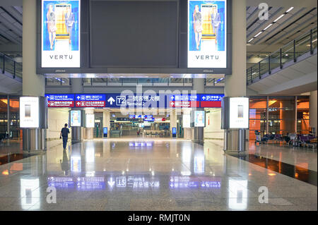 HONG KONG - CIRCA DECEMBER, 2014: inside of Hong Kong International Airport. Hong Kong International Airport is the main airport in Hong Kong. Stock Photo