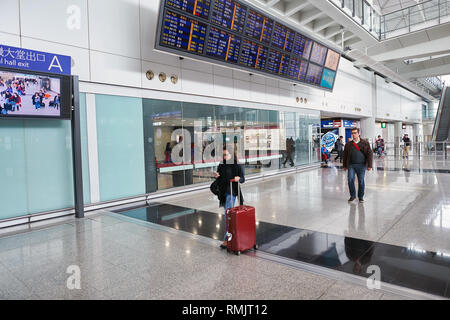 HONG KONG - CIRCA DECEMBER, 2014: inside of Hong Kong International Airport. Hong Kong International Airport is the main airport in Hong Kong. Stock Photo