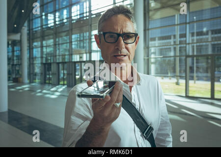 Businessman on the phone call in office Stock Photo
