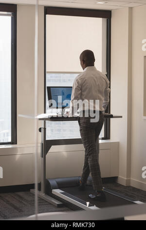 Man working on desktop pc in the office Stock Photo