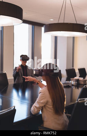 People using virtual reality headset Stock Photo