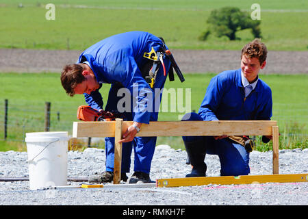 Builders mark out the profile for a building at a construction site in Westland, New Zealand Stock Photo