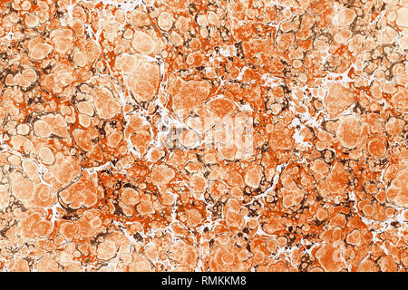 Brown stains of mixed paint with white streaks. Marble texture effect. Viewed from above in full frame background concept Stock Photo