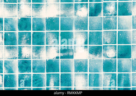 Blue tiles with white grid borders and stains in full frame abstract background or paper cover concept Stock Photo