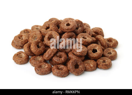 Pile of chocolate cereal rings isolated on white Stock Photo