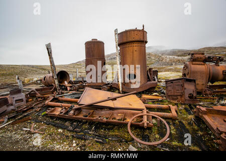 Rusty remains at Mansfield Camp, Spitsbergen, Svalbard, Norway. Stock Photo