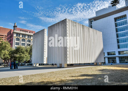 Dallas, Texas, United States of America - December 31, 2016. Kennedy Memorial in Dallas, TX, with people and surrounding buildings. Stock Photo