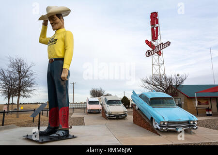 Amarillo, Texas, United States of America - January 2, 2017. Exterior view of RV Museum in Amarillo, TX, with cars and statue. Stock Photo
