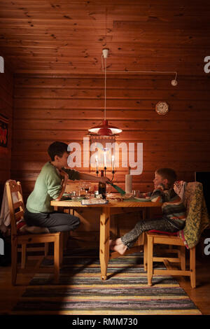 Mother with son having meal Stock Photo