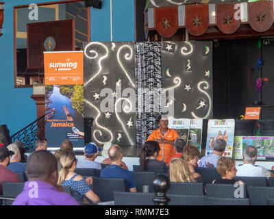 Ocho Rios Jamaica - 5 February 2019: Tourist Guide making presentation to Tourists Stock Photo