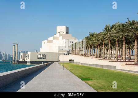 Doha, Qatar - November 9, 2016. Exterior view of the Museum of Islamic Art in Doha, with palm trees. Stock Photo