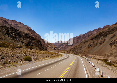 The National Route 7 (Ruta Nacional 7 ), here in the Andes, crosses Argentina from east to west connecting Buenos Aires to Santiago de Chile Stock Photo