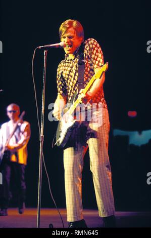 Ac/Dc guitarist Angus Young is shown performing 'live' in concert at the Hartford Civic Civic Center in Hartford, Connecticut. Stock Photo