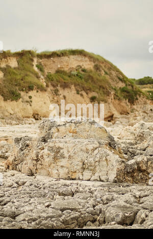 summer landscape with white sharp stones on the hillside meadow before ...